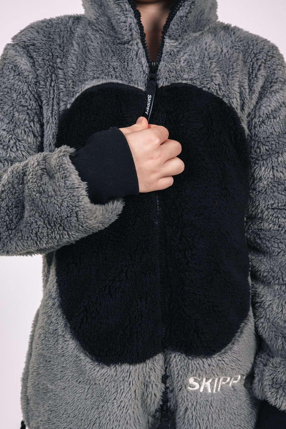 Kinder-Onesie Teddy – Waschbär